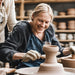 Potter Finessing Her Sculpture on a special needs wheel